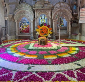 Shiva linga with flower decoration